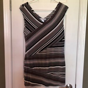 Maternity shirt. A line pattern earth tones.